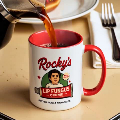 Coffee being poured into a mug with 'Rocky's Lip Fungus Creme' branding on a table.